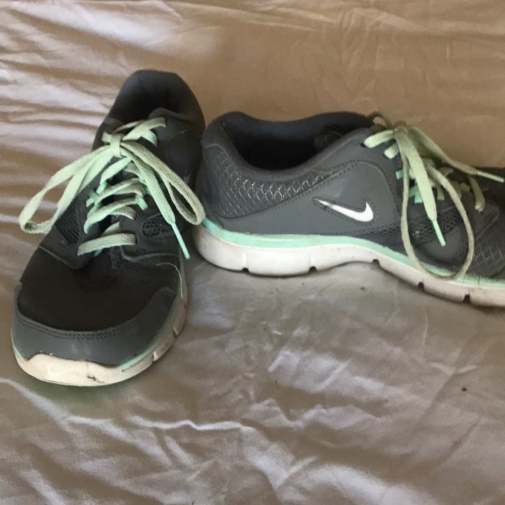 Grey and teal Nike flex experience run 3